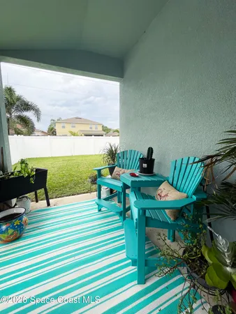 a view of backyard with small cabin