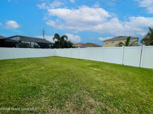 a house view with a garden space