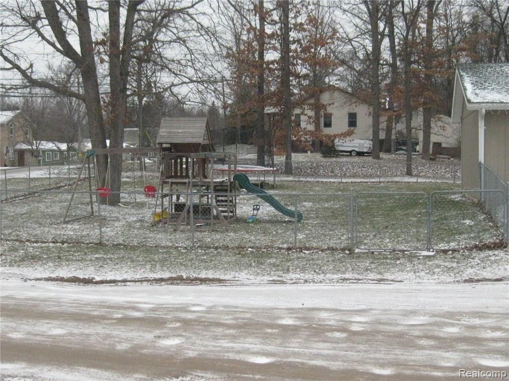 676 North Conklin Road Lake Orion, MI 48362 - Photo 6 of 39 Large fenced yard
