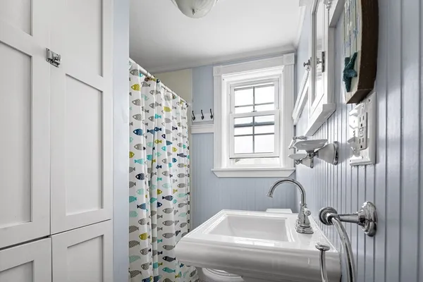 a kitchen with stainless steel appliances granite countertop a sink refrigerator and microwave