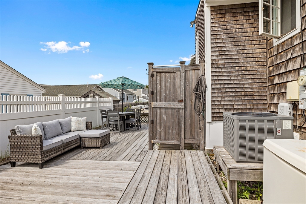 36 Ocean Road North Duxbury, MA 02332 - Photo 30 of 36 a view of roof deck with couches and wooden floor