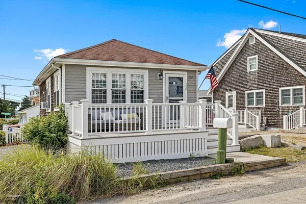 a front view of a house with a porch