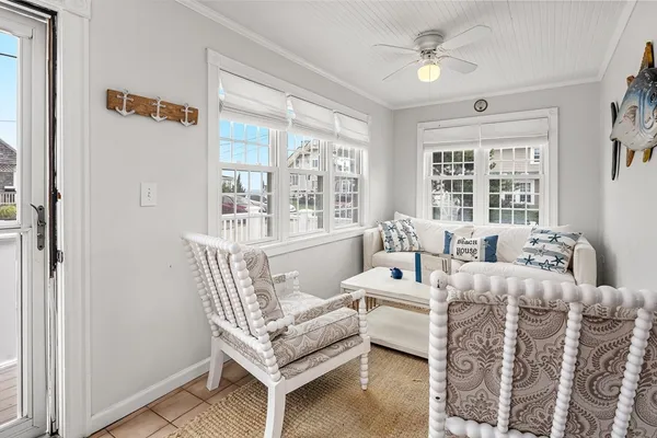 a living room with furniture and a window