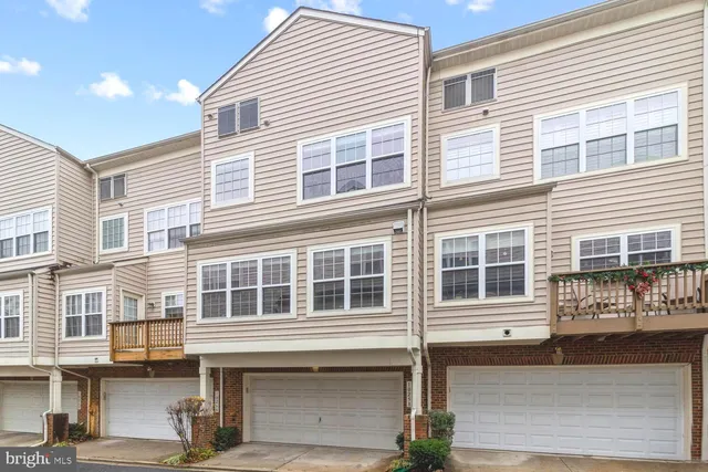 a front view of a building with glass windows