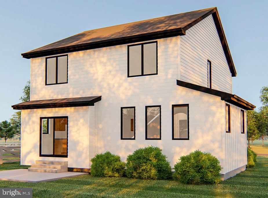 901 Bear Neck Edgewater, MD 21037 - Photo 2 of 14 a front view of a house with garden