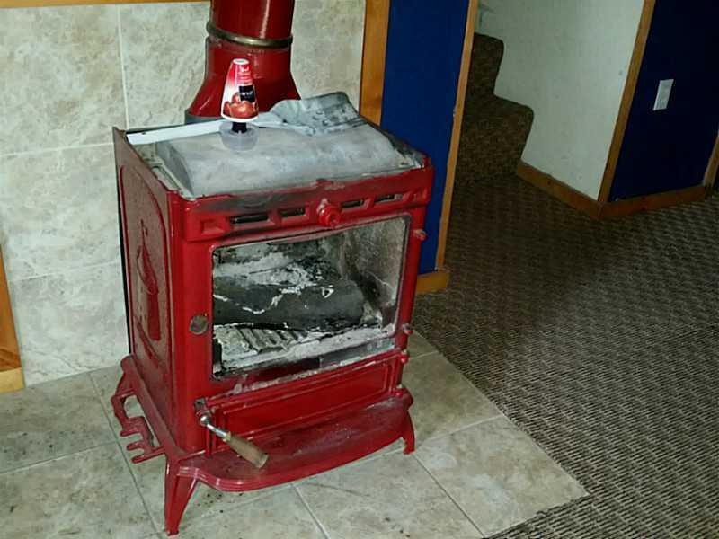 359 Cardville Road Greenbush, ME 04418 - Photo 12 of 28 Basement. wood stove hook up to keep...