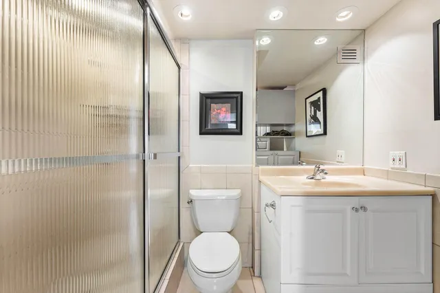 a building outdoor space with patio furniture and potted plants