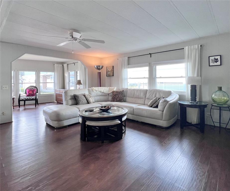 1100 South Belcher Road, Unit 772 Largo, FL 33771 - Photo 20 of 84 a living room with furniture and a large window