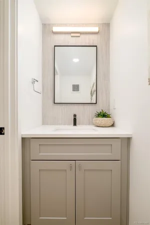 a sink with a mirror