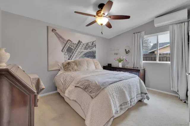 a view of a swimming pool with potted plants