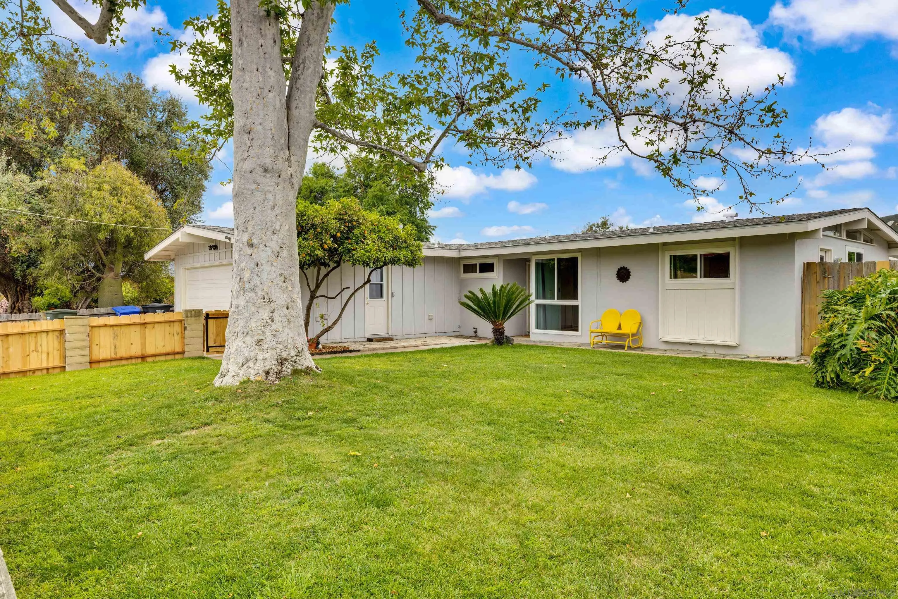13834 Tobiasson Road Poway, CA 92064 - Photo 3 of 31 a view of a house with a yard