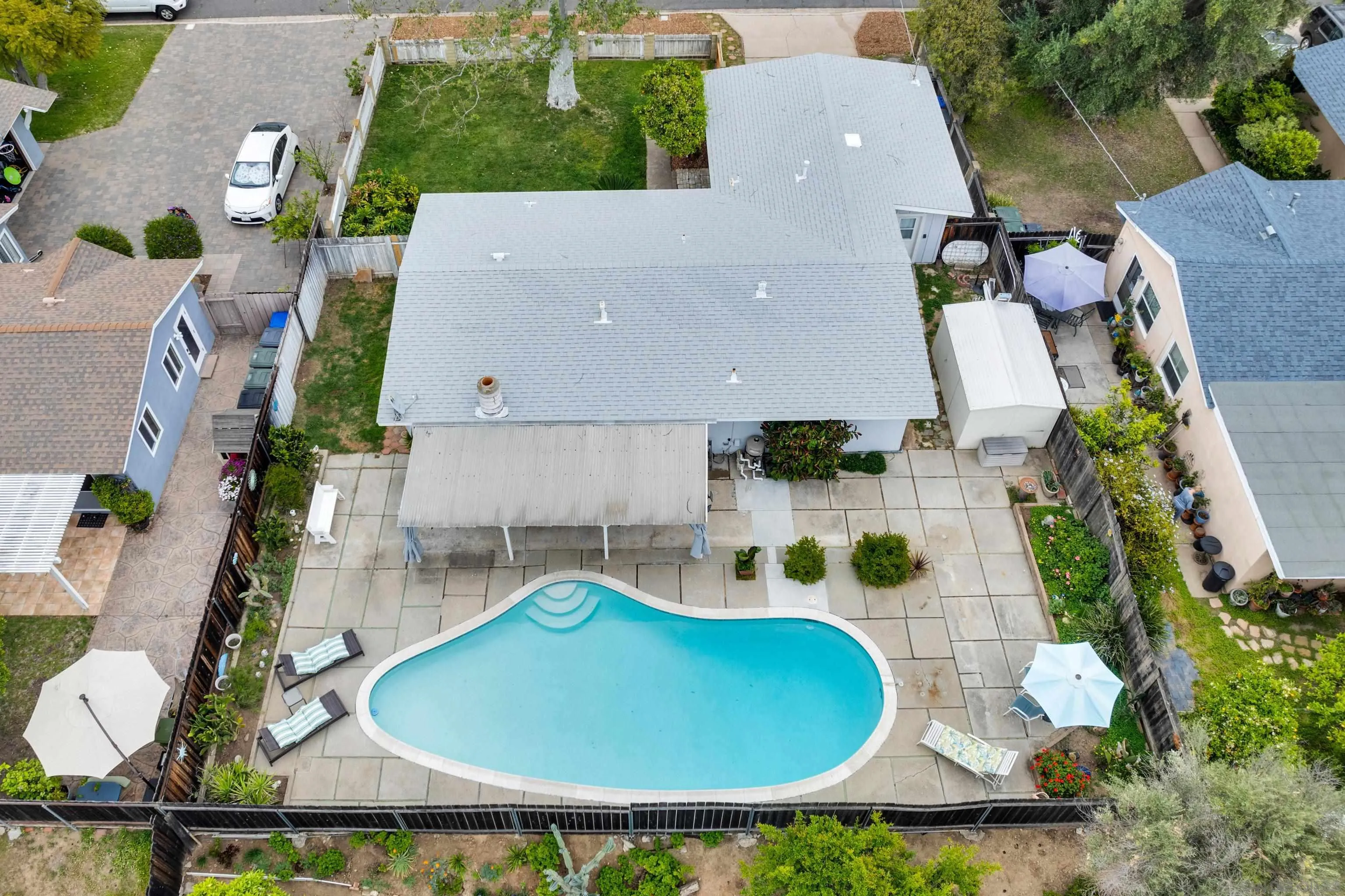13834 Tobiasson Road Poway, CA 92064 - Photo 6 of 31 an aerial view of a house with swimming pool and patio
