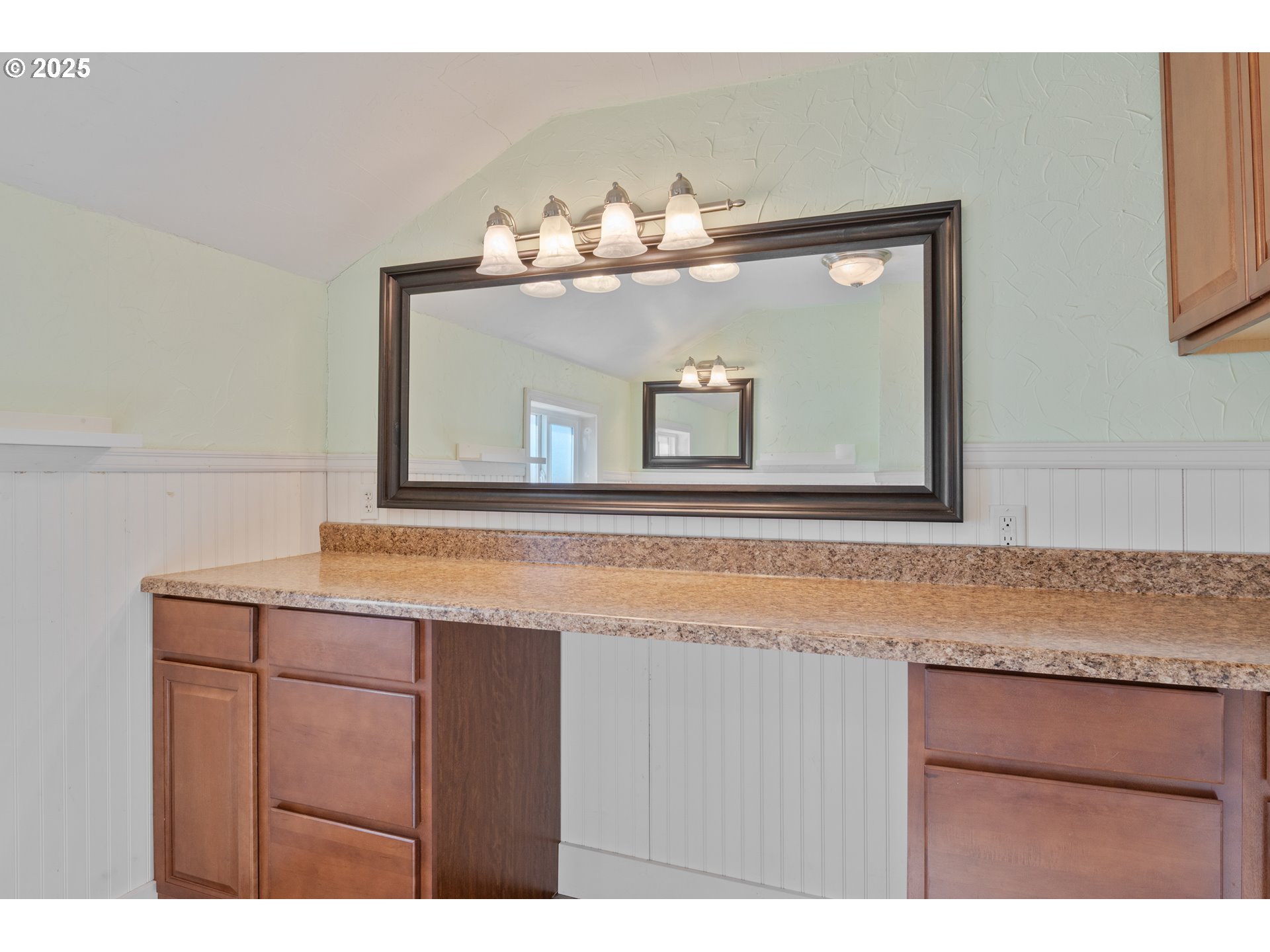 1 Southwest D Street Castle Rock, WA 98611 - Photo 21 of 40 a bathroom with a sink vanity and a mirror