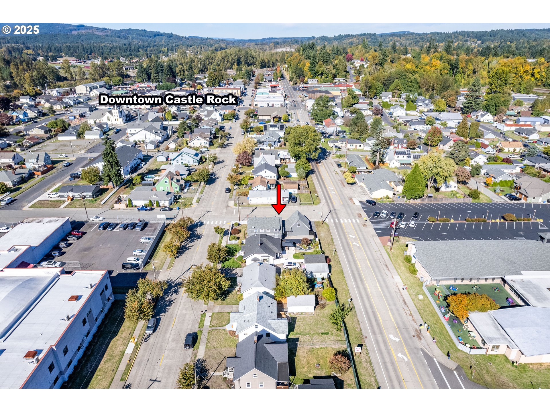 1 Southwest D Street Castle Rock, WA 98611 - Photo 35 of 40 an aerial view of residential houses with outdoor space