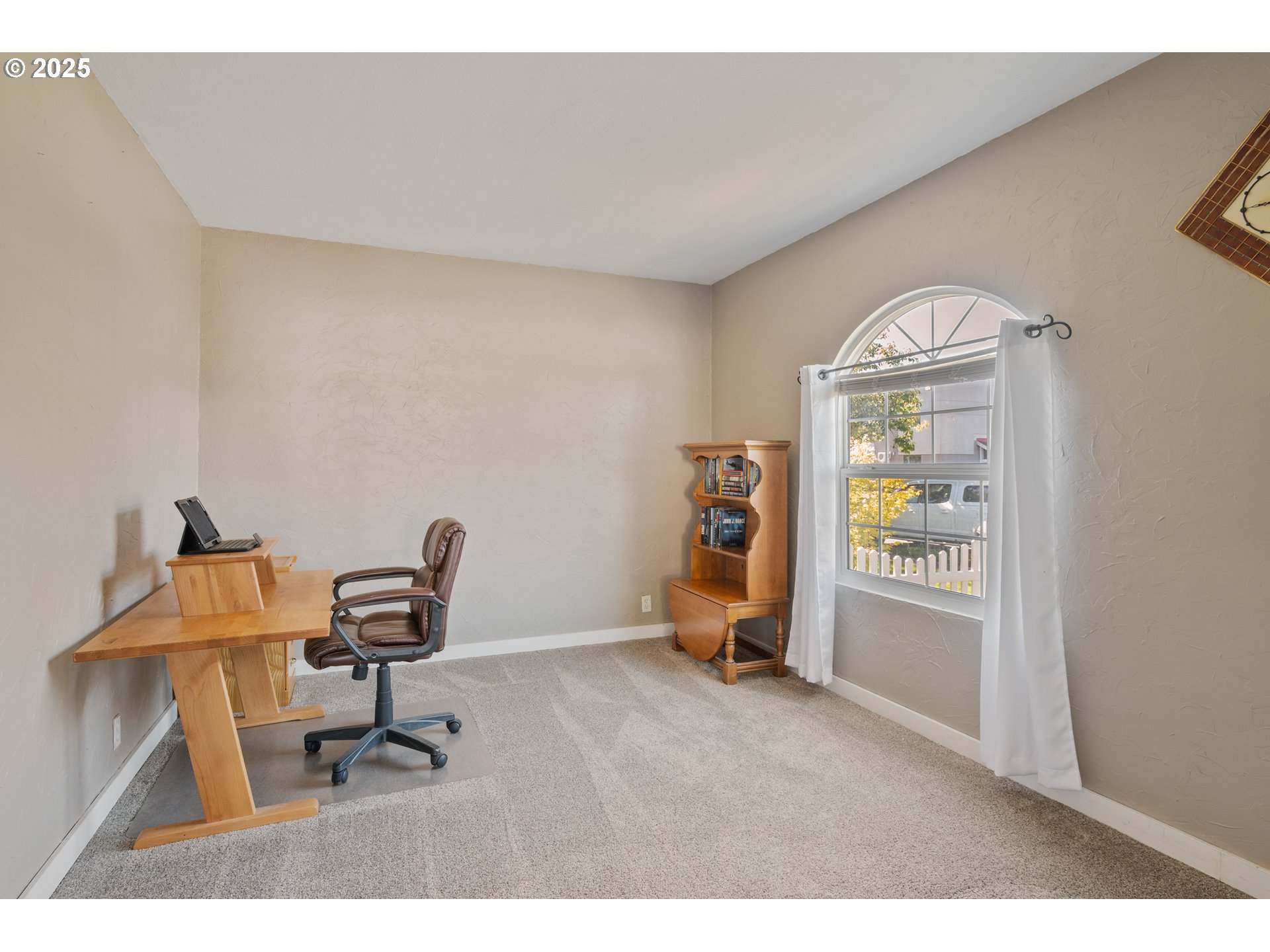 1 Southwest D Street Castle Rock, WA 98611 - Photo 9 of 40 a view of a workspace with furniture and a window