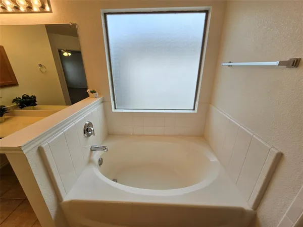 a bathroom with a bathtub