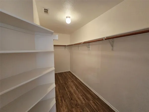 a view of small space with racks on the wall