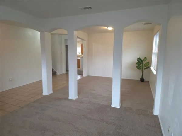 a view of a room with an entryway