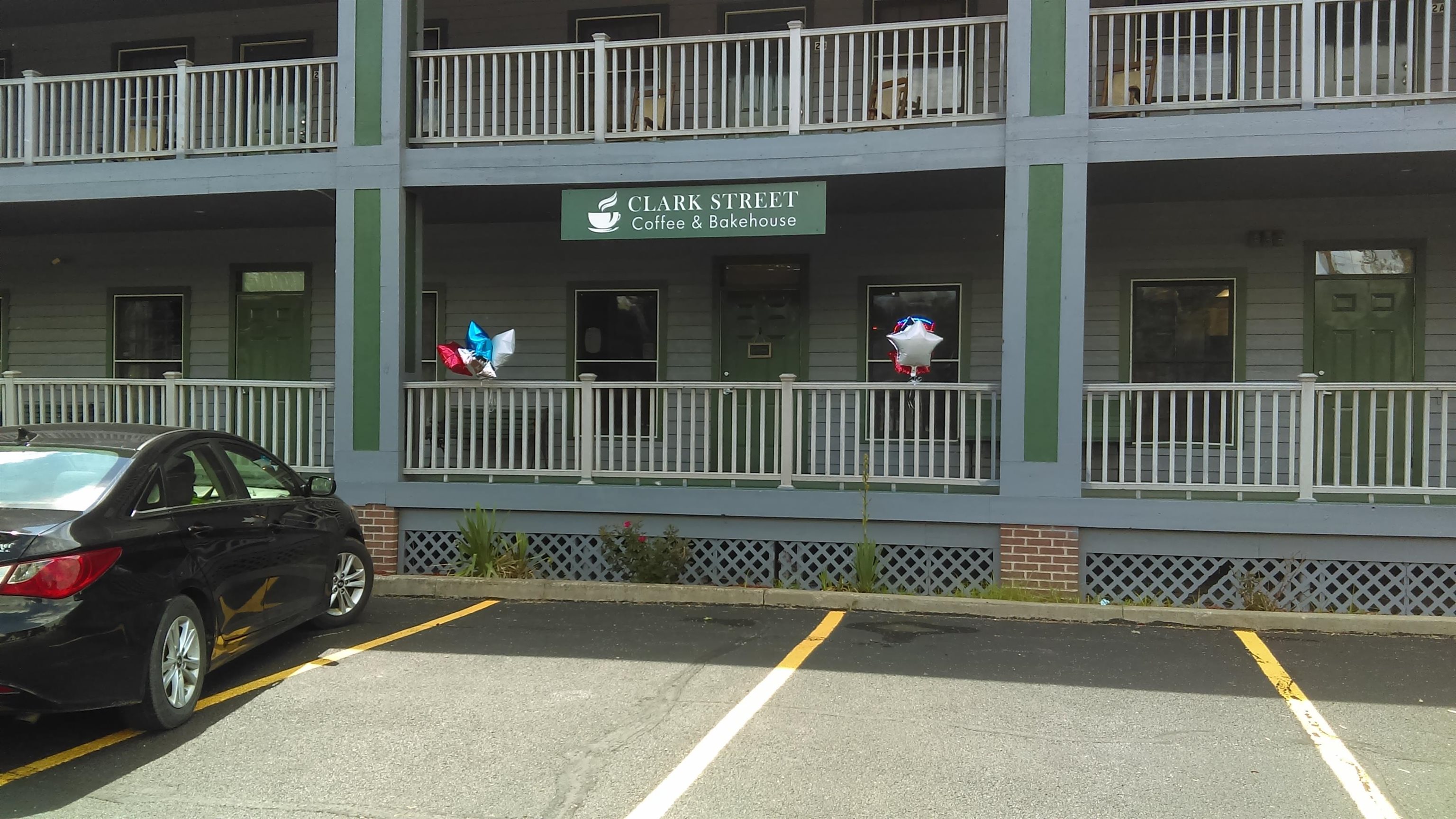 a view of a street with deck