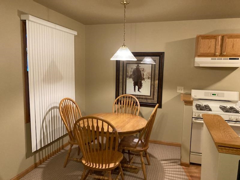 325 South Clark Street Utica, IL 61373 - Photo 26 of 28 a dining room with furniture and window