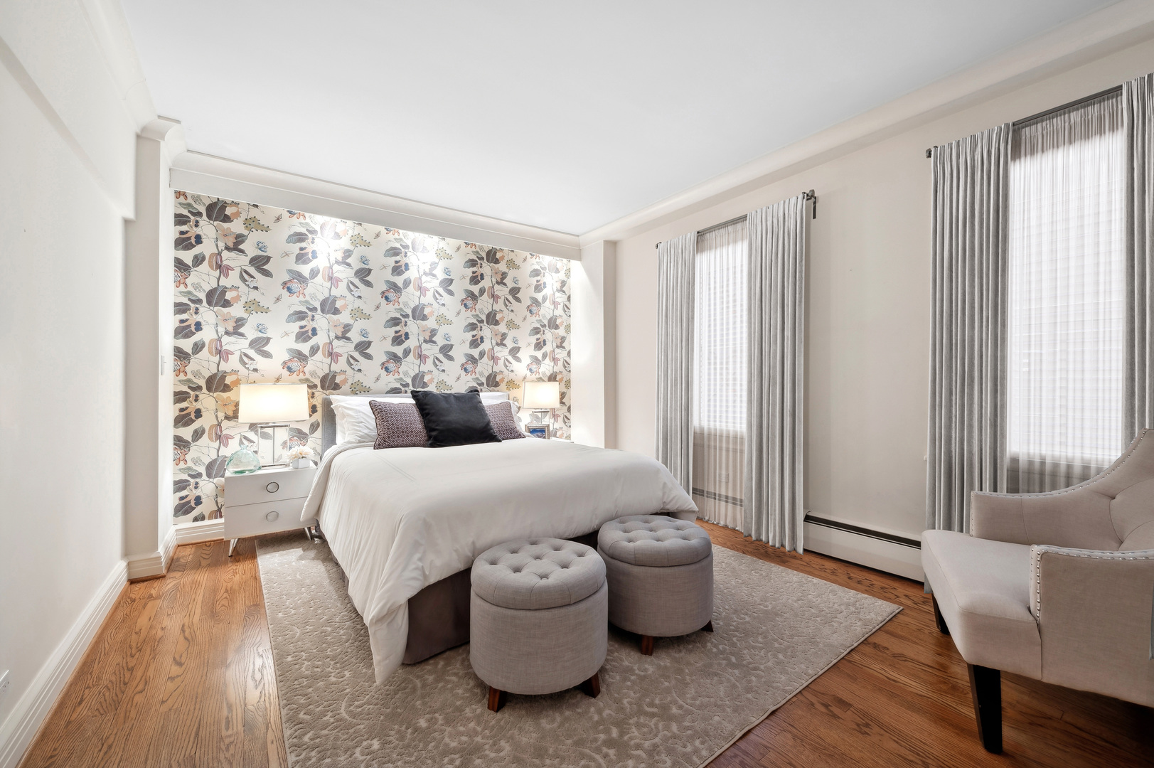 33 East Bellevue Place, Unit 3W Chicago, IL 60611 - Photo 14 of 31 a spacious bedroom with a bed and a large window