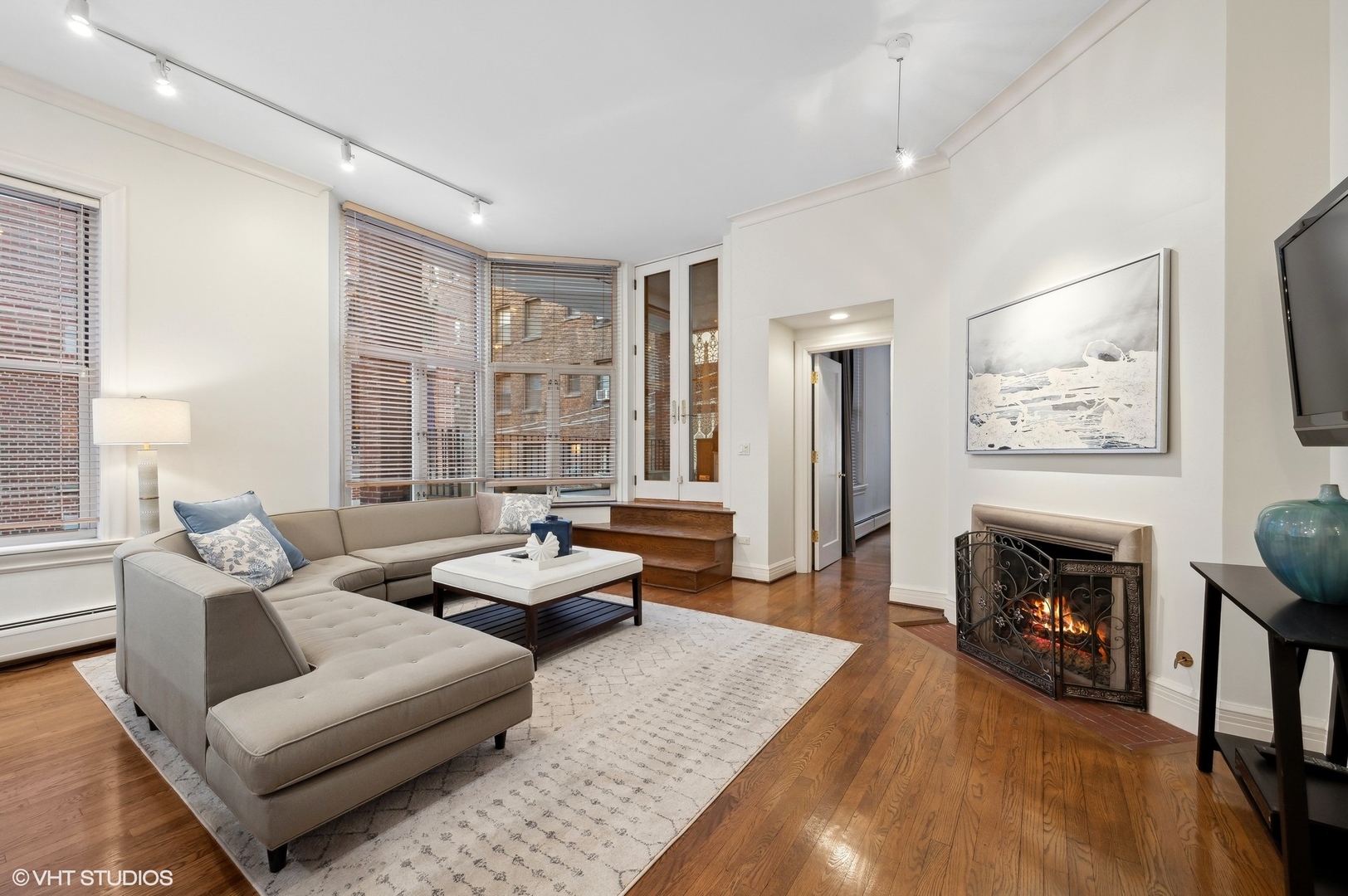 33 East Bellevue Place, Unit 3W Chicago, IL 60611 - Photo 18 of 31 a living room with furniture and a fireplace