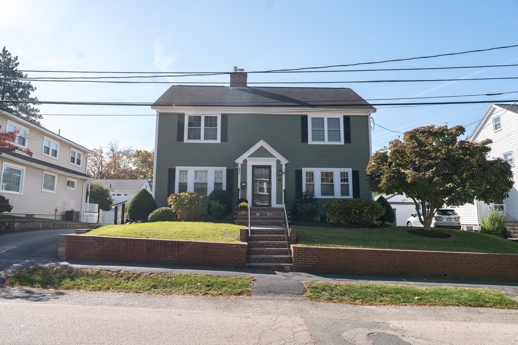 29 Governors Road Milton, MA 02186 - Photo 1 of 42 a front view of a house with a yard