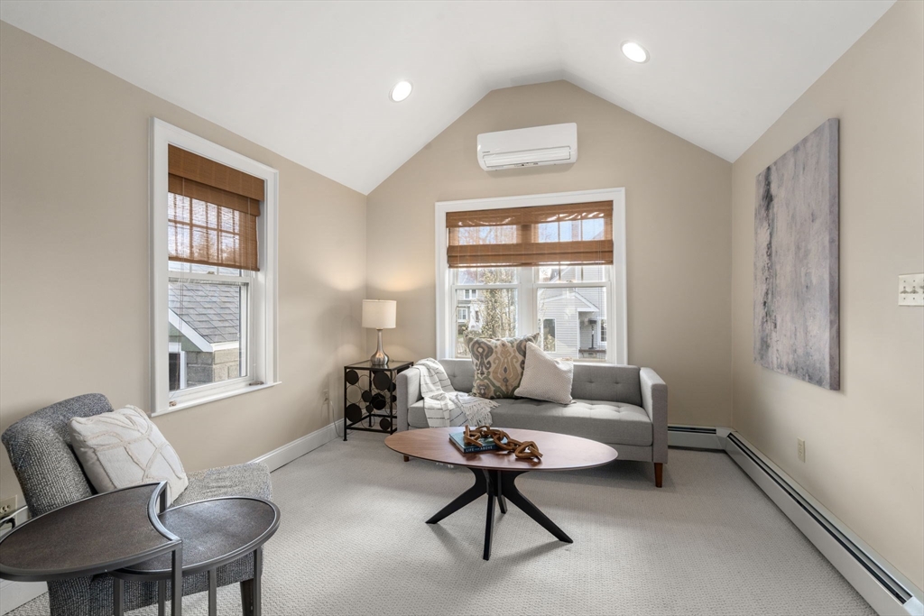 29 Governors Road Milton, MA 02186 - Photo 11 of 42 a living room with furniture and a window