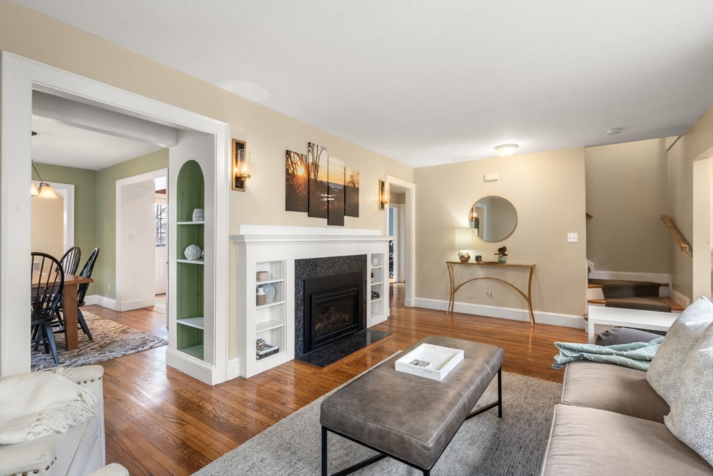 29 Governors Road Milton, MA 02186 - Photo 3 of 42 a living room with furniture and a fireplace
