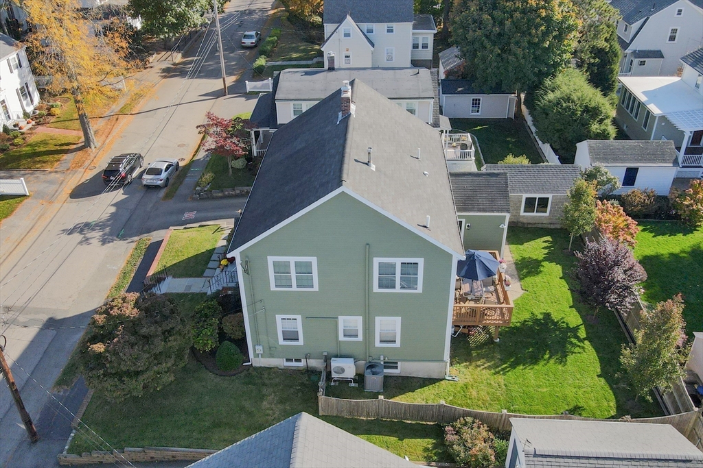 29 Governors Road Milton, MA 02186 - Photo 40 of 42 a aerial view of a house with swimming pool garden and patio
