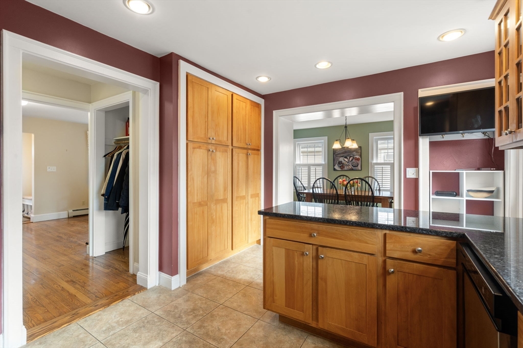 29 Governors Road Milton, MA 02186 - Photo 10 of 42 a kitchen with stainless steel appliances granite countertop a refrigerator and a sink