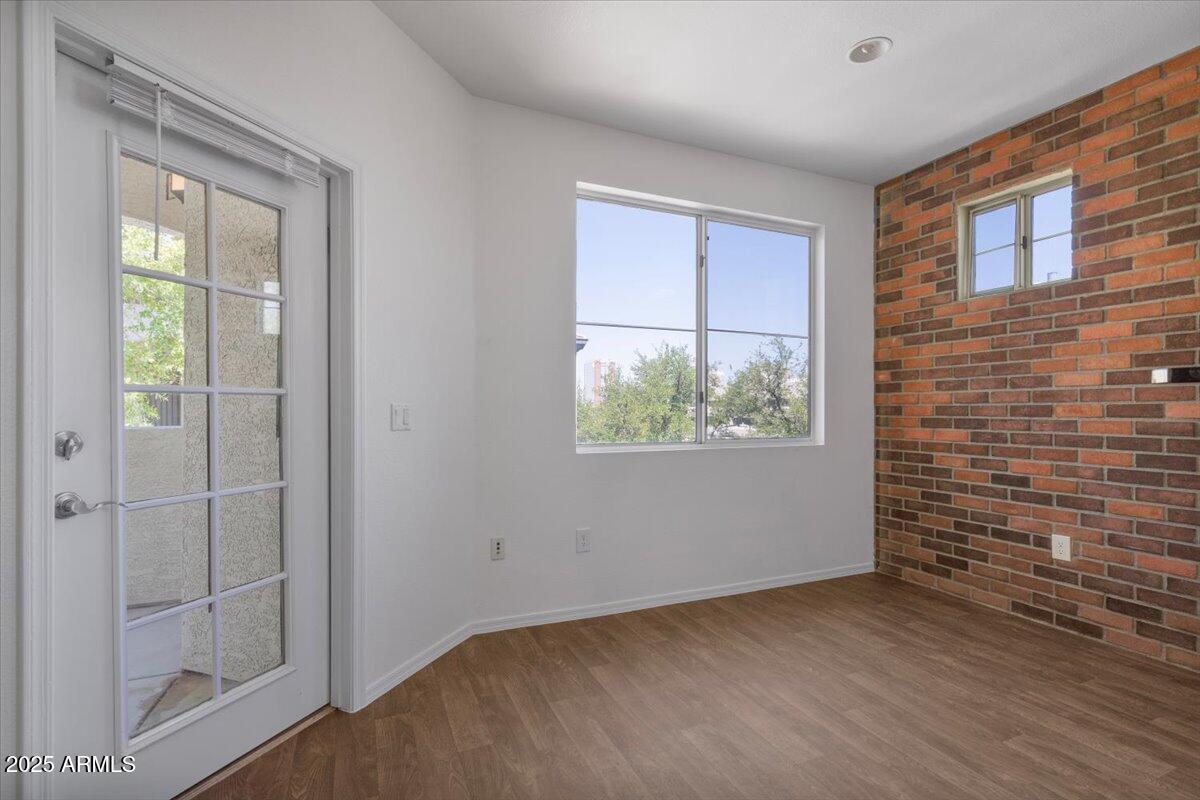 3302 North 7th Street, Unit 319 Phoenix, AZ 85014 - Photo 11 of 28 a view of an empty room with a window