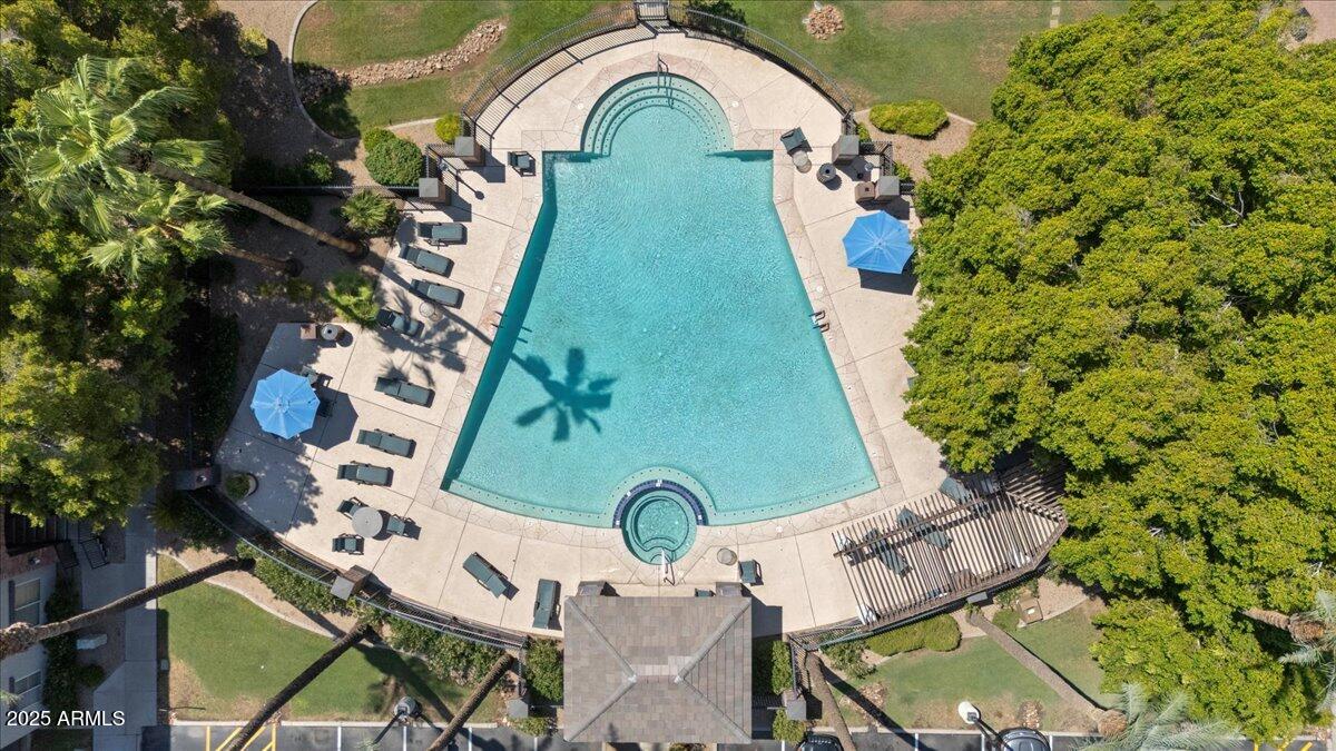 3302 North 7th Street, Unit 319 Phoenix, AZ 85014 - Photo 25 of 28 an aerial view of a house with garden space and street view