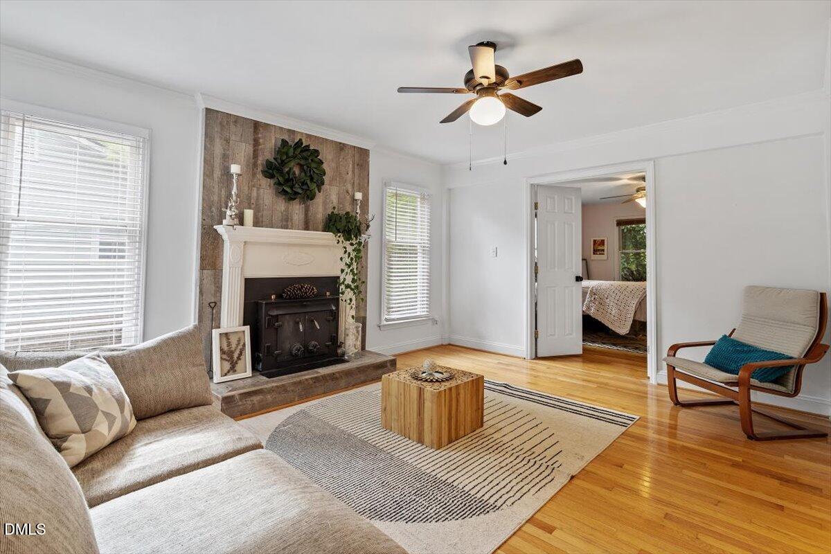 1007 Castalia Drive Cary, NC 27513 - Photo 1 of 30 a living room with furniture and a fireplace