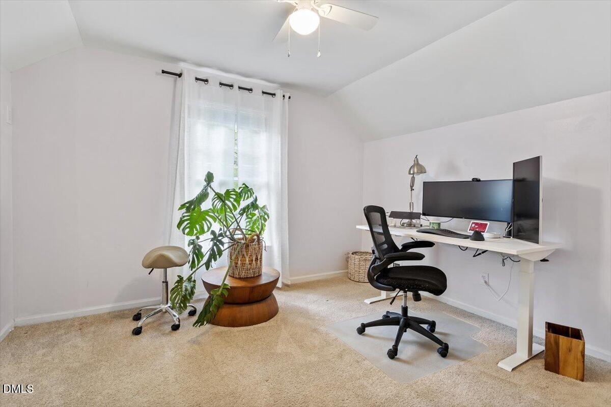 1007 Castalia Drive Cary, NC 27513 - Photo 26 of 30 a view of workspace with paintings on the wall