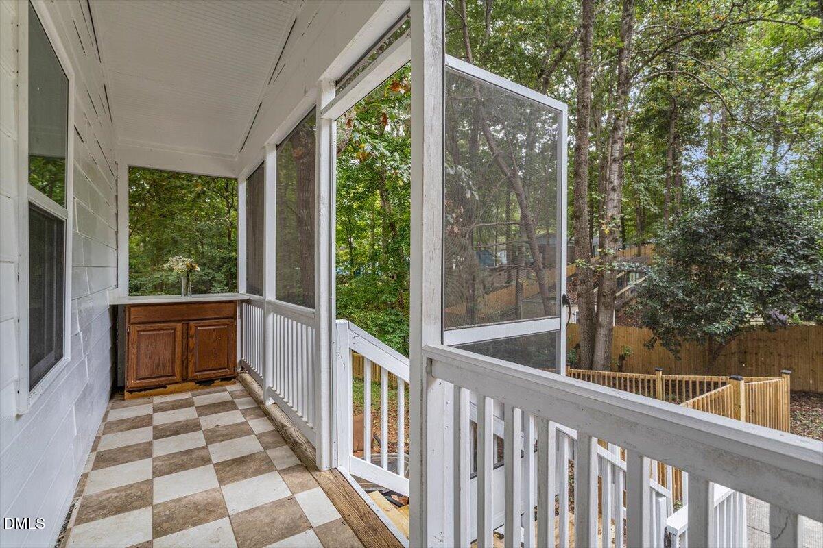1007 Castalia Drive Cary, NC 27513 - Photo 29 of 30 a view of a balcony with wooden floor