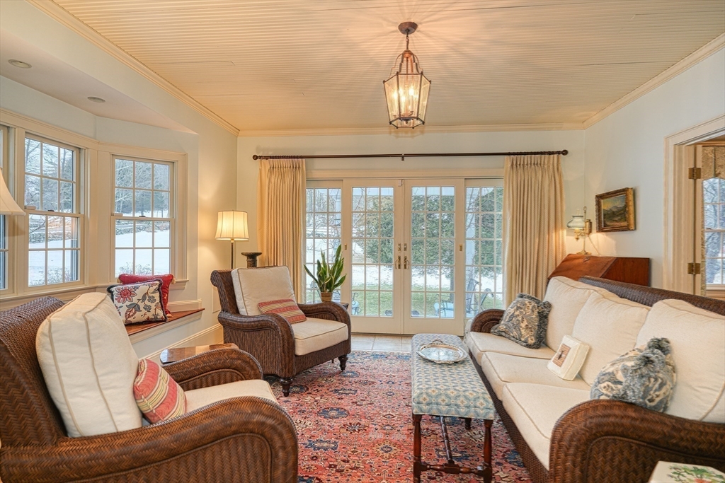 191 Claybrook Road Dover, MA 02030 - Photo 12 of 34 a living room with furniture and floor to ceiling windows
