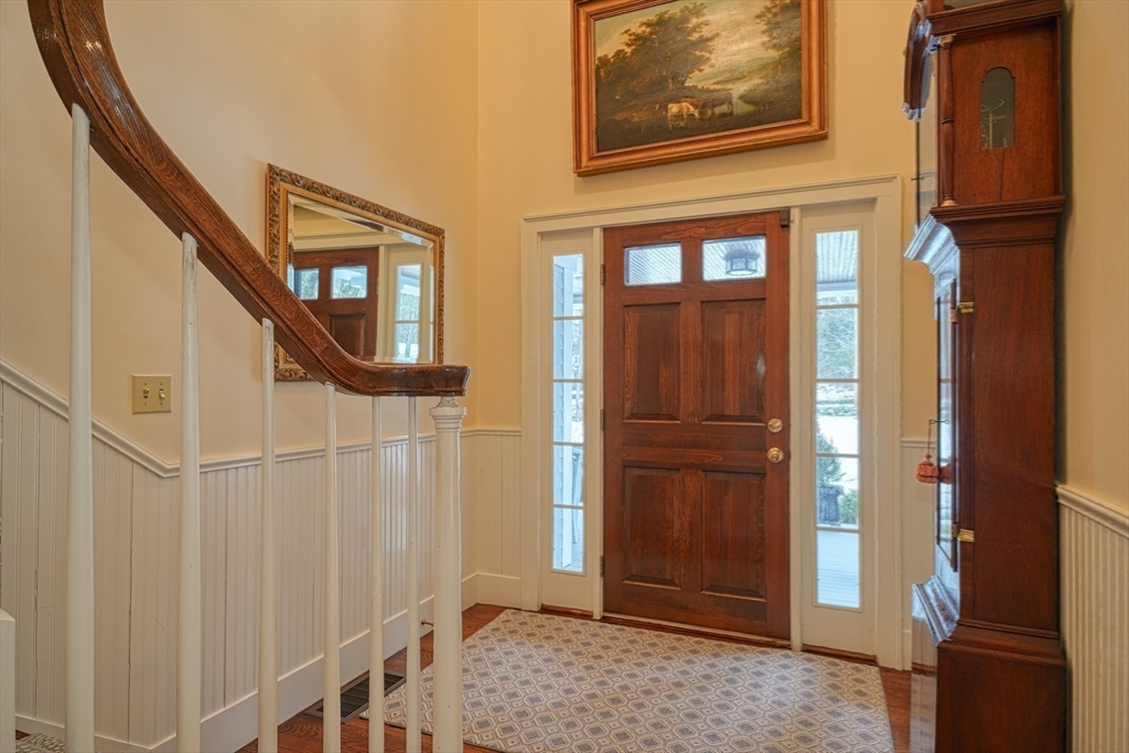 191 Claybrook Road Dover, MA 02030 - Photo 15 of 34 front view of a house with a door