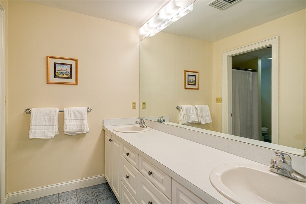 191 Claybrook Road Dover, MA 02030 - Photo 20 of 34 a bathroom with a sink and a mirror