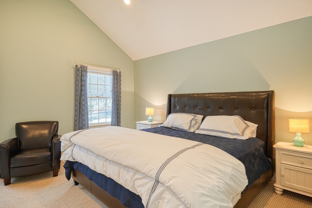 191 Claybrook Road Dover, MA 02030 - Photo 22 of 34 a bedroom with a bed and a couch