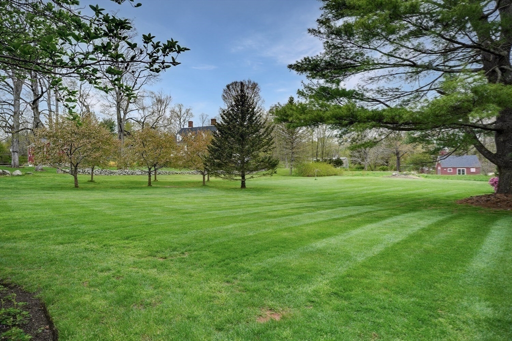 191 Claybrook Road Dover, MA 02030 - Photo 33 of 34 a view of grassy field with benches and trees all around