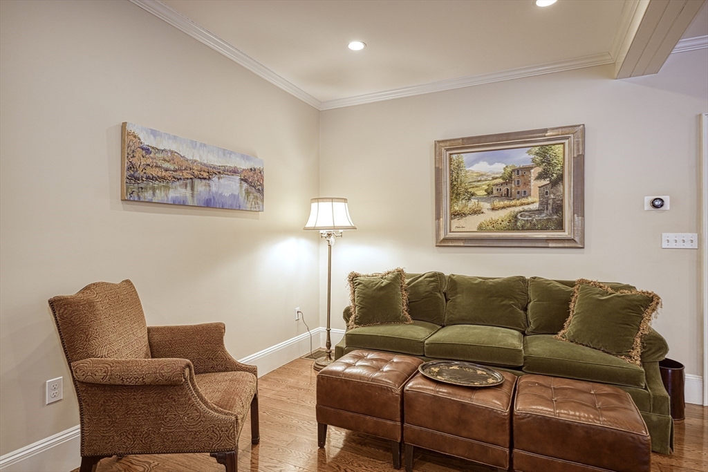 191 Claybrook Road Dover, MA 02030 - Photo 10 of 34 a living room with furniture a couch and painting on the wall