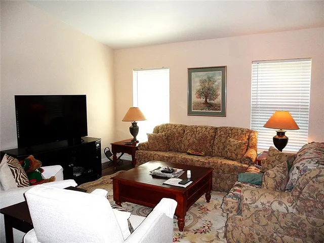 a front view of a house with grey walls