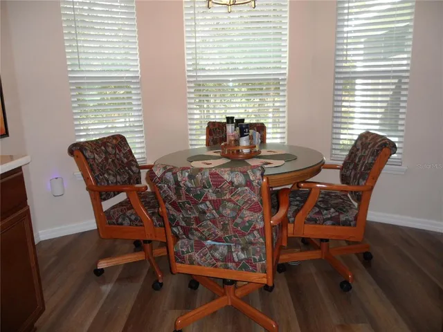 a kitchen with sink and cabinets