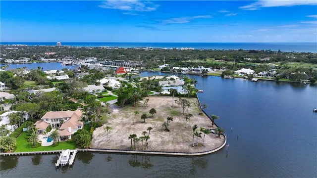 a view of a lake with a building in the background