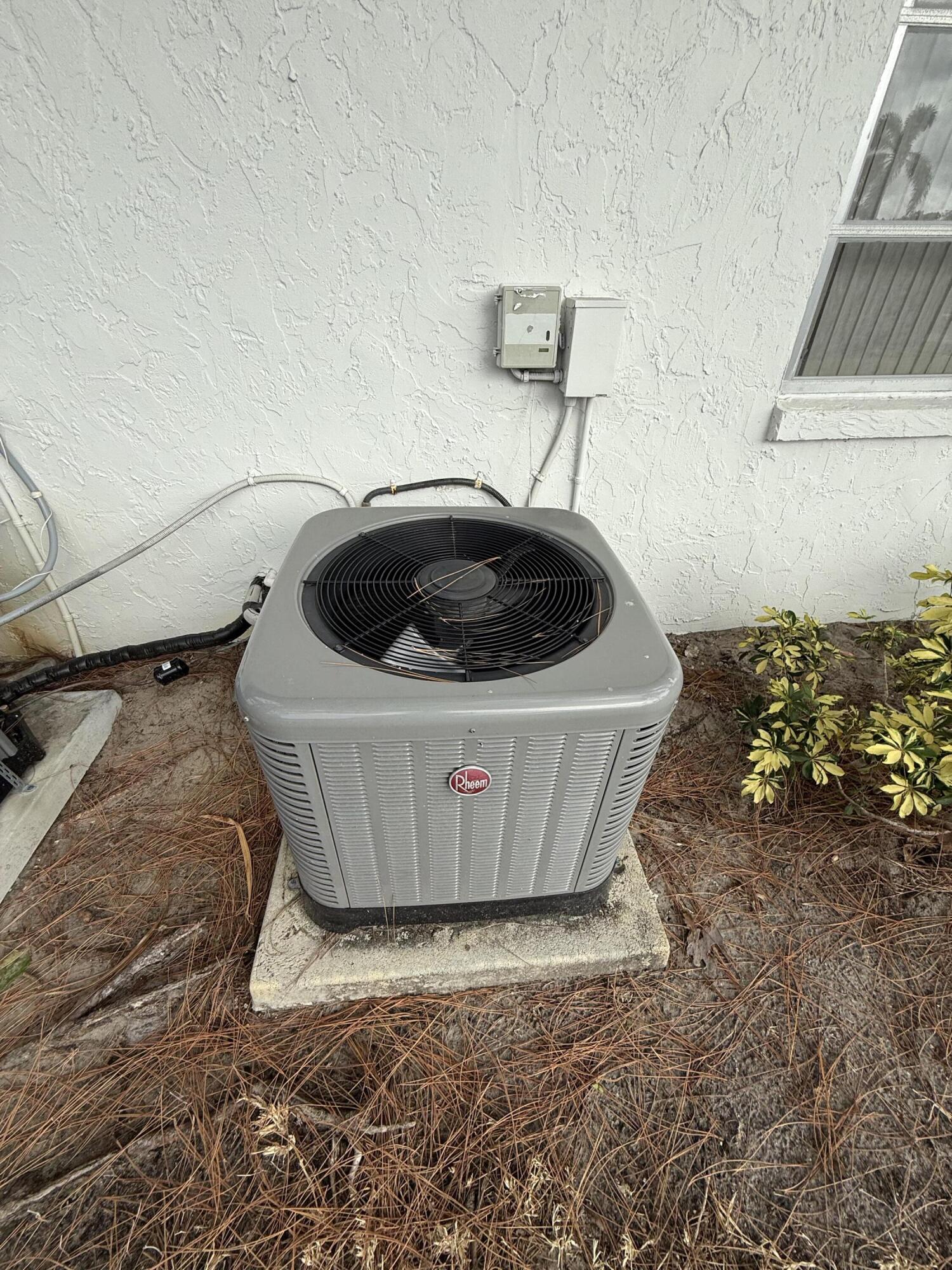 5139 Poppy Place, Unit A Delray Beach, FL 33484 - Photo 22 of 36 a view of a sink in a bathroom