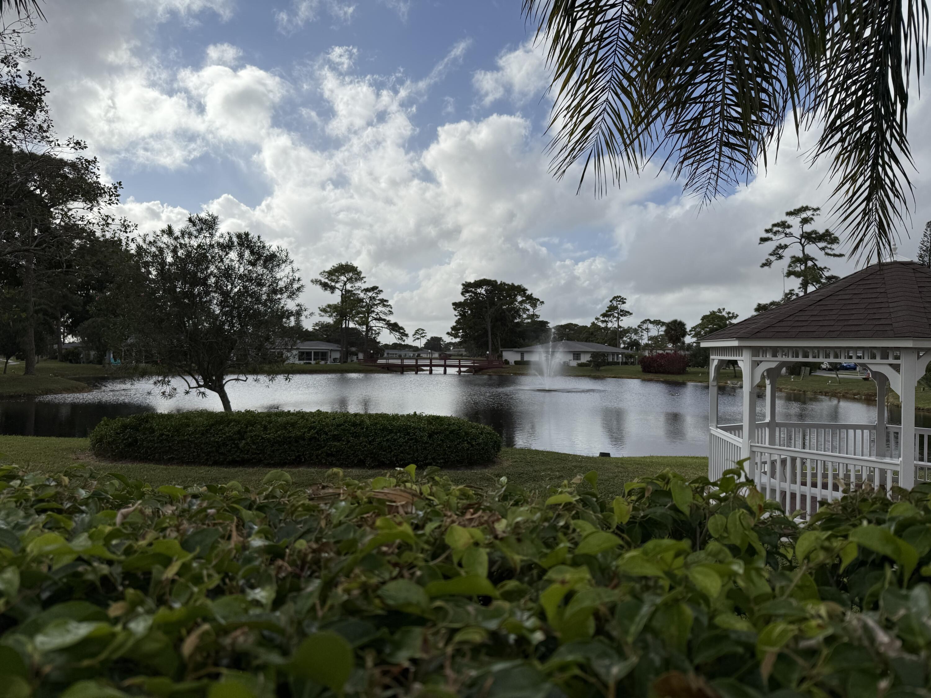 5139 Poppy Place, Unit A Delray Beach, FL 33484 - Photo 6 of 36 a view of a lake