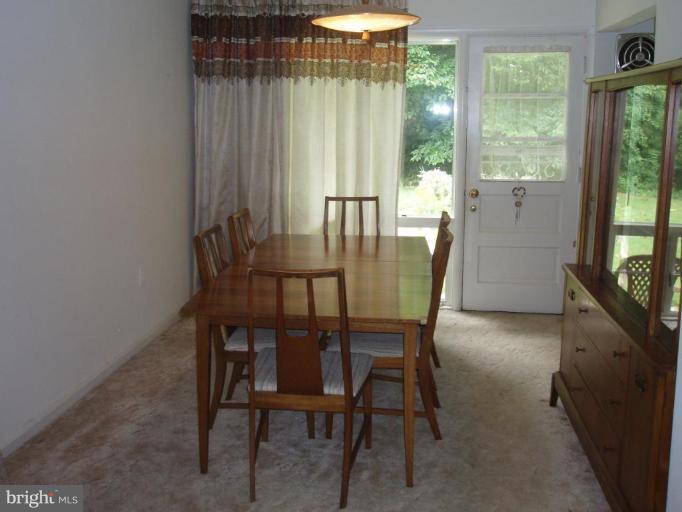 9718 Holmhurst Road Bethesda, MD 20817 - Photo 4 of 12 Dining room with door to rear yard