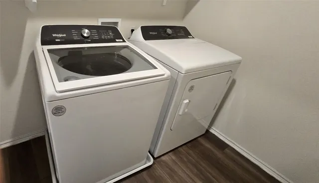 a utility room with dryer and washer