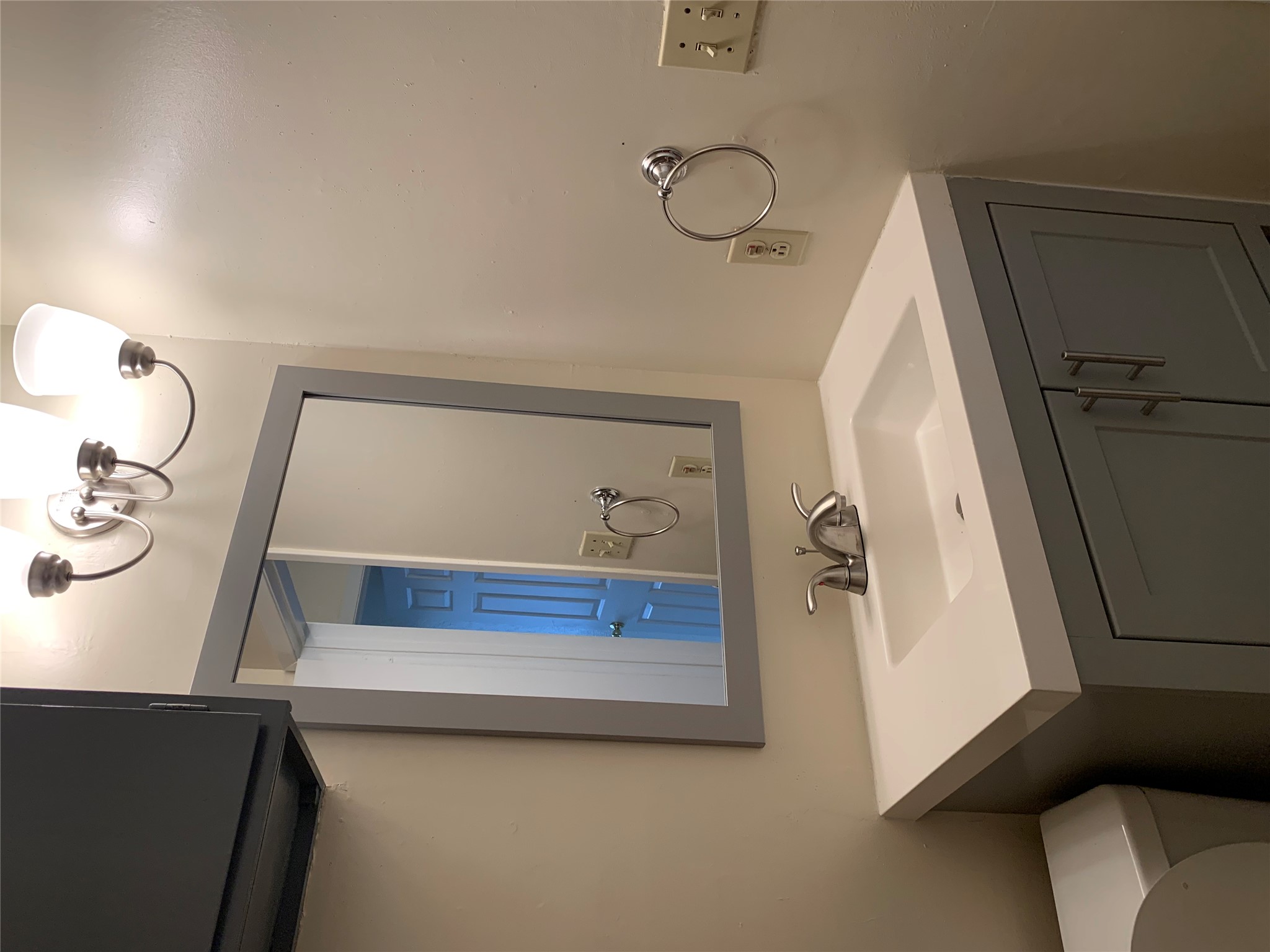10447 Doc Holliday Trail, Unit B Austin, TX 78753 - Photo 13 of 19 Half bathroom featuring vanity and suspended lighting
